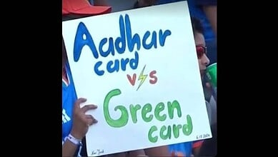 A spectator displays a poster during a T20 World Cup match in Mumbai