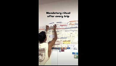 Man posts flight tickets on the wall in his room