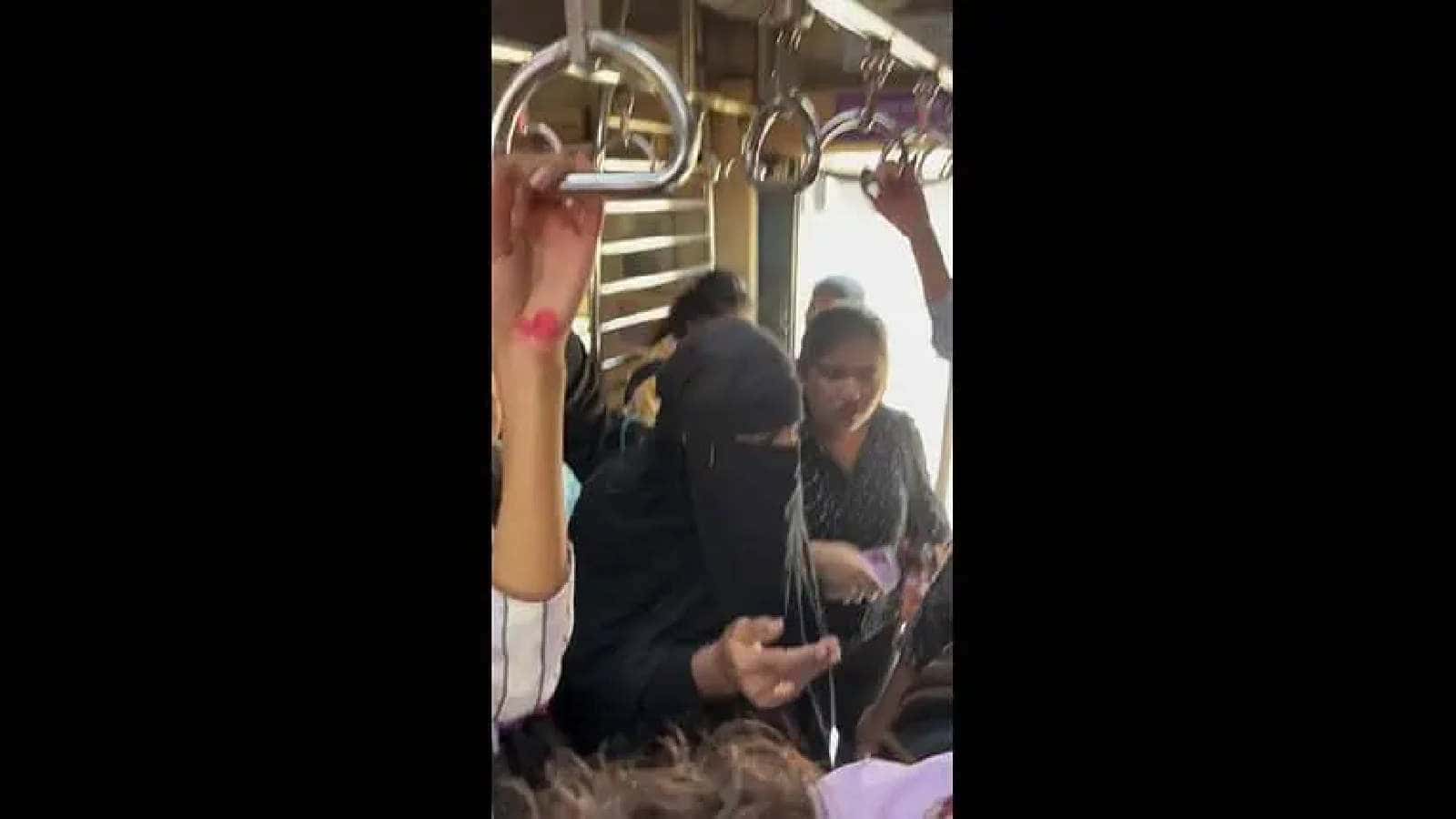 Man disguised in burqa travelling in women’s coach of Mumbai local train.