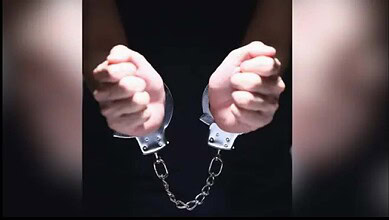 Representational image of a person in hand cuffs