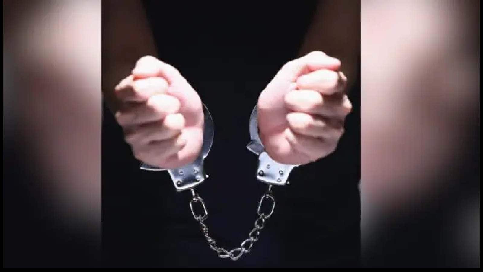 Representational image of a person in hand cuffs
