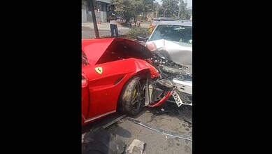 Red Ferrari involved in a collision with a silver car near actor BalaKrishan's residence in Hyderabad.