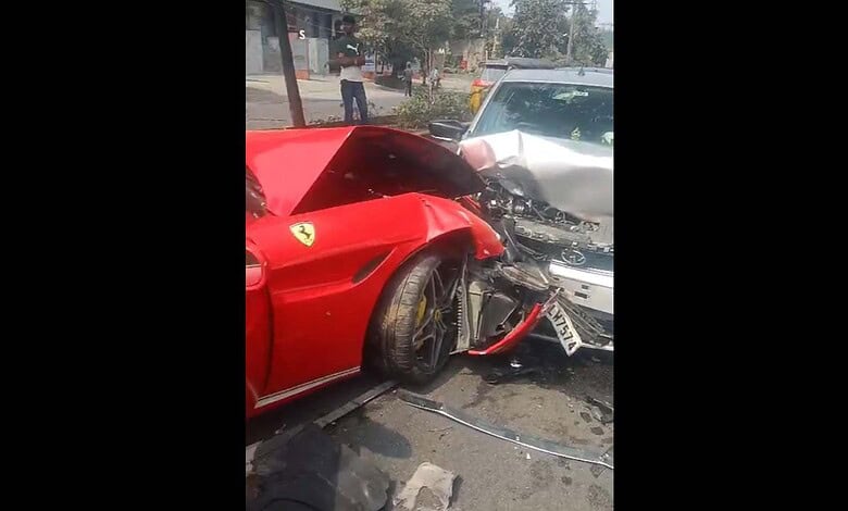 Red Ferrari involved in a collision with a silver car near actor BalaKrishan's residence in Hyderabad.
