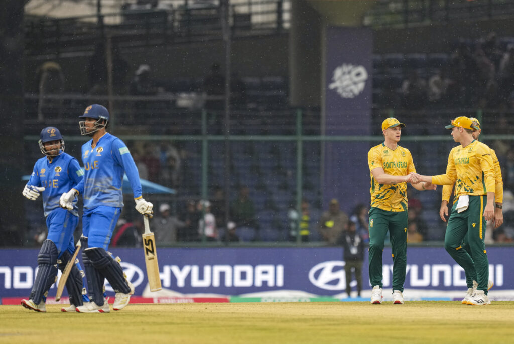 South Africa cricket players celebrating after winning against UAE in T20 World Cup match.
