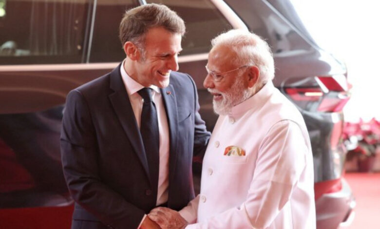 Prime Minister Modi shakes hands with French President Emmanuel Macron in Mumbai on February 17.