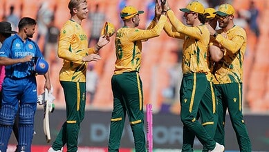 South Africa cricketers celebrate the win over Afghanistan in super over during the T20 World Cup cricket match between Afghanistan and South Africa in Ahmedabad.