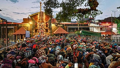 Pathanamthitta: Rush of people as they wait to offer prayers at the Sabarimala temple ahead of the 'Makaravilakku' festival, in Pathanamthitta district, Kerala, Tuesday, Jan. 13, 2026. (PTI Photo)