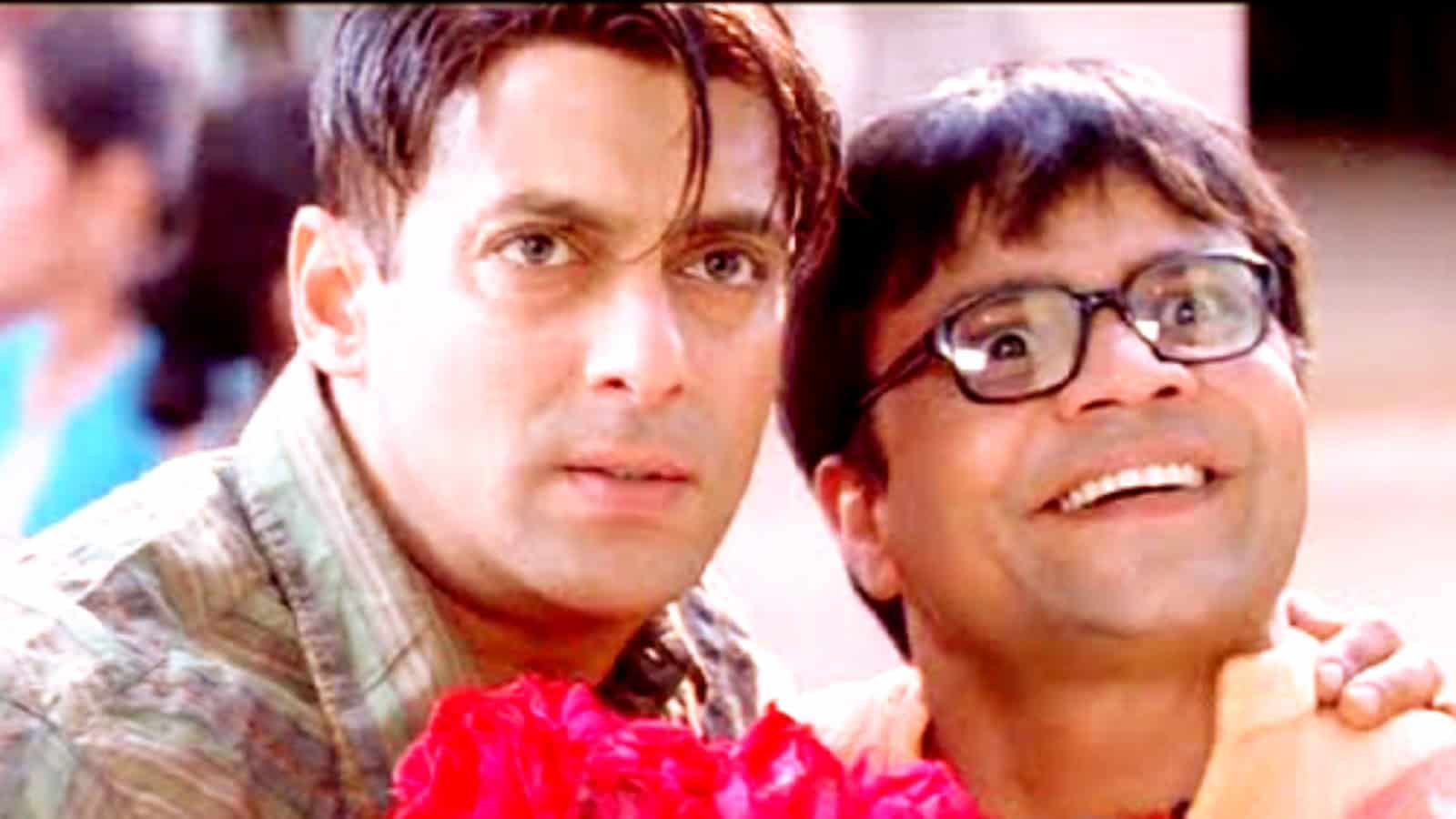 Salman Khan with Rajpal Yadav, smiling and close-up shot.