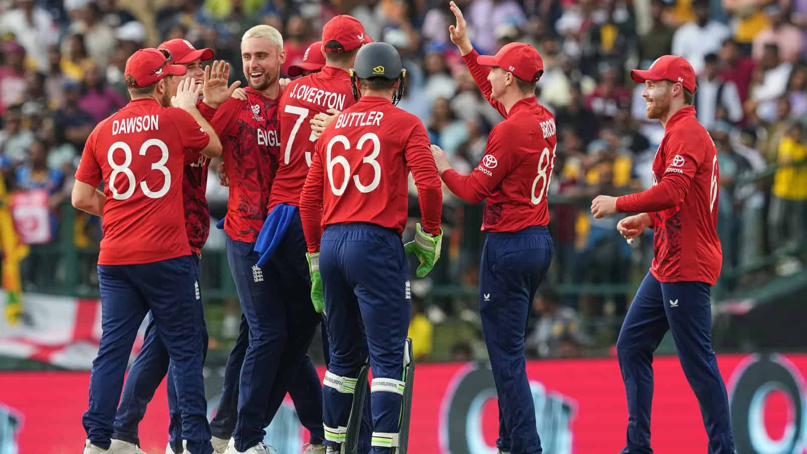 England cricket team celebrating during a match at the T20 World Cup.
