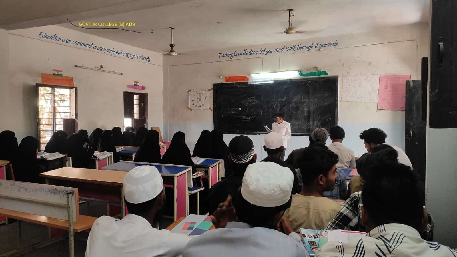 Image shows people studying in Telangana Open School Society