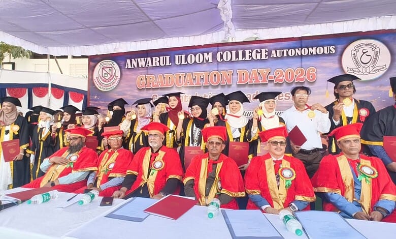 Students of Anwar-ul- Uloom College pose with their medals at the graduation ceremony