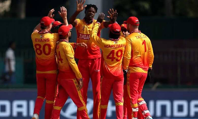 Zimbabwe players celebrates a wicket against Oman in the T20 World Cup match on Monday