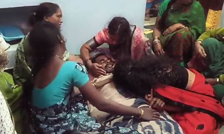 Family members surround Mahadev's body