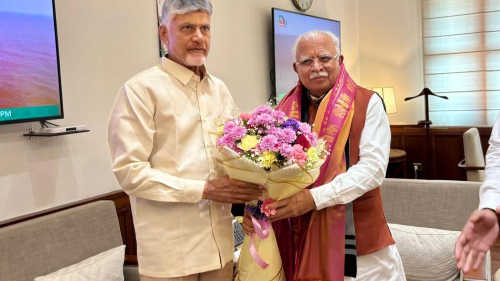 Naidu presents flowers to Centre's official for Polavaram project approval.