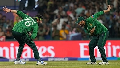 Pakistan cricket players celebrating during the T20 World Cup match against the USA.