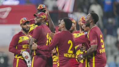 West Indies' players celebrate after winning an ICC Men's T20 World Cup 2026 cricket match between England and West Indies at the Wankhede Stadium in Mumbai on Wednesday. (PTI Photo/Kunal Patil)