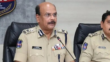 Telangana DGP speaking at a press conference on peaceful municipal polls.