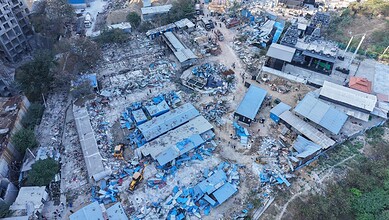 An overview of HYDRAA's anti-encroachment drive conducted near Madhapur on Thursday