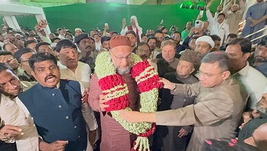 AIMIM President Asaduddin Owaisi welcomed by his brother and other leaders as the party celebrates its 68th Foundation Day at Darussalam in Hyderabad.
