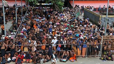 Large crowd protesting at Sabarimala temple against women's entry.