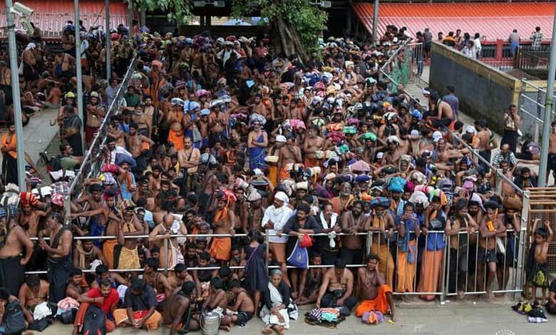 Large crowd protesting at Sabarimala temple against women's entry.