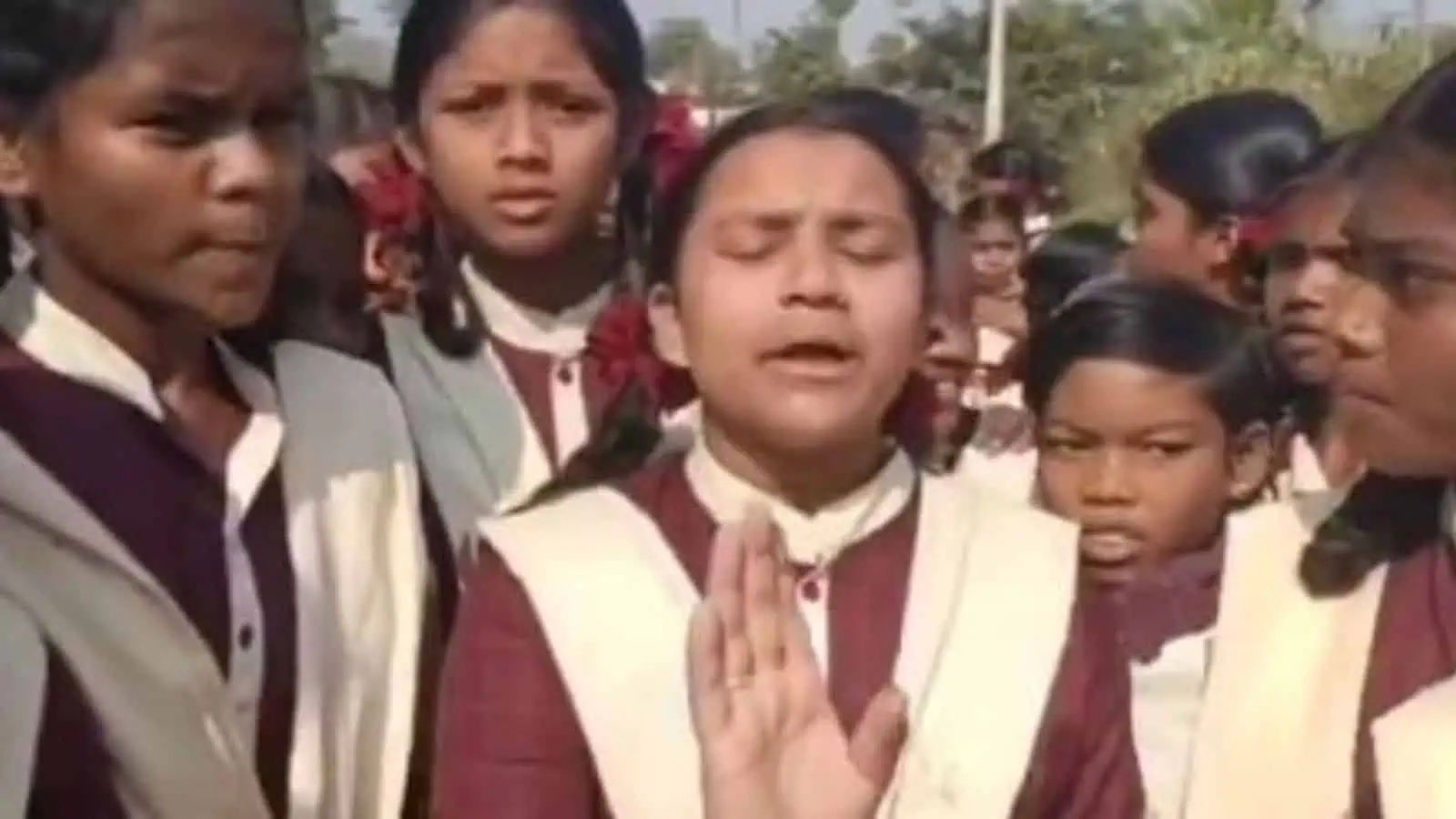 Group of students protesting water shortage at government school in Telangana.