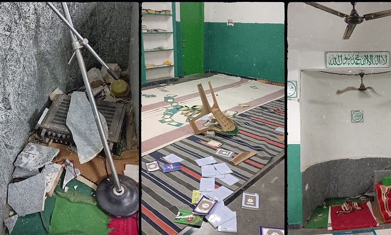 Messy mosque with scattered Qurans and prayer mats on the floor.