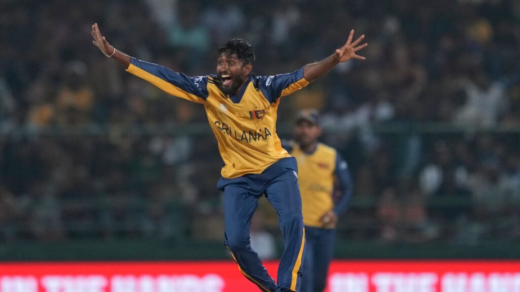 Sri Lankan cricket player celebrating after winning against Australia in T20 World Cup 2026.