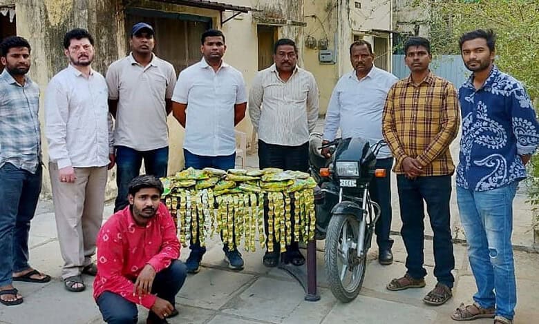 Group of men with seized ganja milkshake in Hyderabad police operation.
