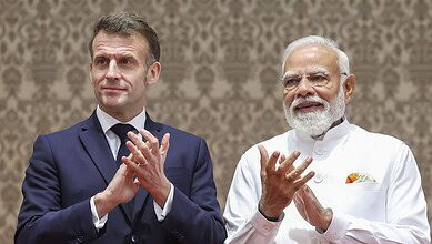 Prime Minister Narendra Modi with French President Emmanuel Macron during a joint press meet in Mumbai