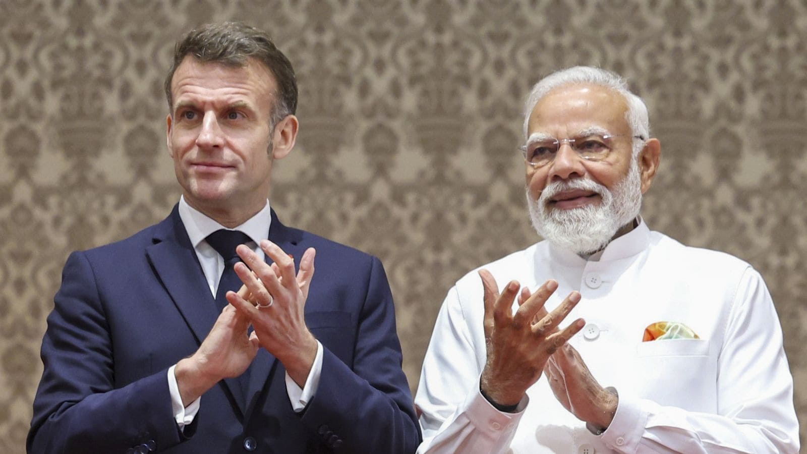 Prime Minister Narendra Modi with French President Emmanuel Macron during a joint press meet in Mumbai