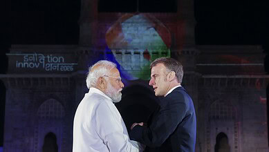 French President Macron meeting Indian officials in Mumbai during his visit.