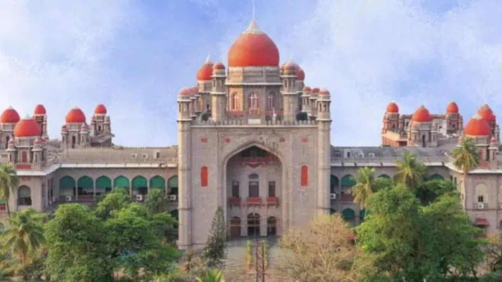 Telangana High Court with domed architecture and lush greenery.