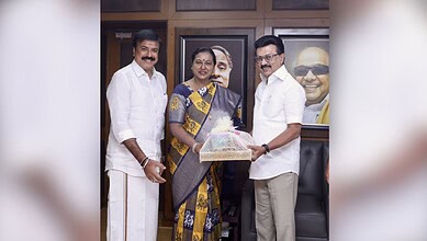 DMDK General Secretary Premathala Vijayakanth (center) with Tamil Nadu Chief Minister and DMK president MK Stalin (right) in Chennai
