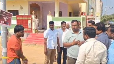 Man arguing with a group of men in Telangana after a violent incident.