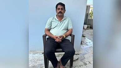 Man sitting outdoors in casual attire at The Siasat Daily office.