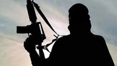 Silhouetted image of a militant holding a rifle during an encounter in Kishtwar, Jammu and Kashmir.