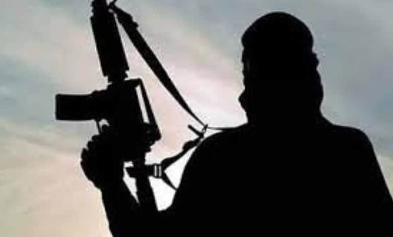 Silhouetted image of a militant holding a rifle during an encounter in Kishtwar, Jammu and Kashmir.
