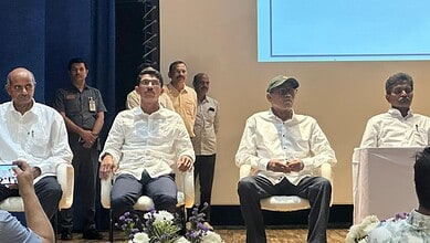 Maoists surrender during a formal event with officials and security personnel present. The event highligh.