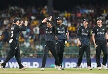 New Zealand cricket players celebrating after winning against Sri Lanka in T20 World Cup match.