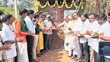 Officials of Karnataka Social Welfare Department inaugurate a barber shop