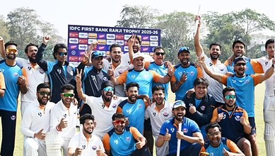Jammu and Kashmir team celebrating their first Ranji Trophy victory with players and staff.