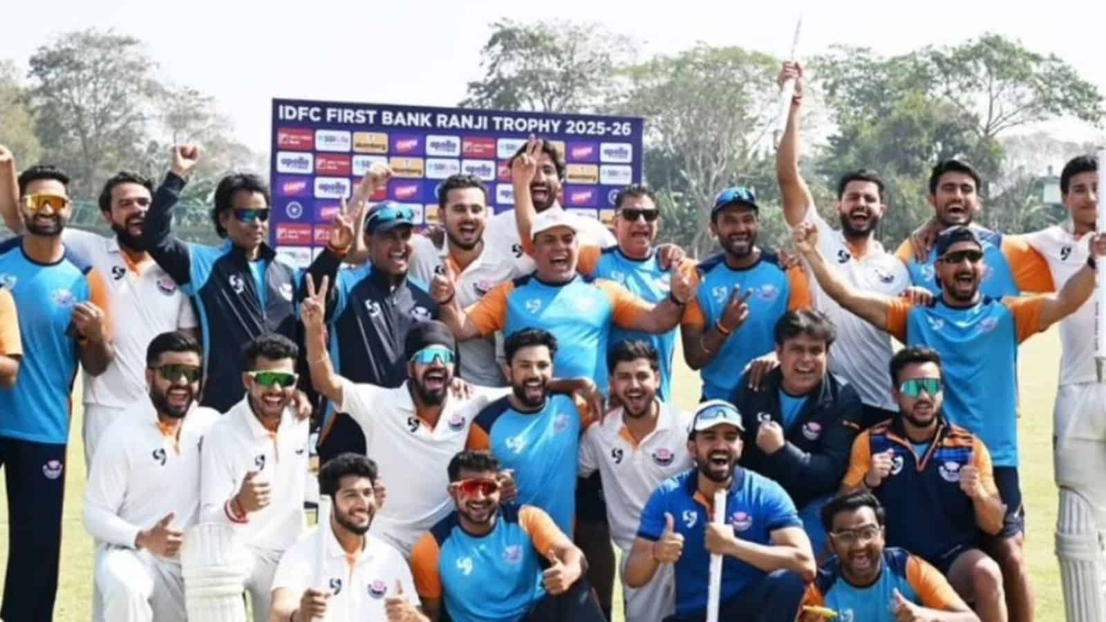 Jammu and Kashmir team celebrating their first Ranji Trophy victory with players and staff.