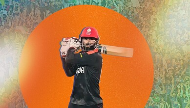 Yuvraj of Canada preparing to bat, inspired by Indian cricket heroes.