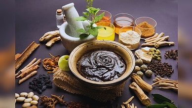 Image shows spices and a mortar pestle