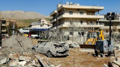Bulldozer clearing debris near damaged buildings in Bednayel, Lebanon’s Bekaa Valley.