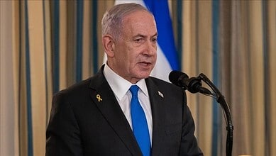 Israeli Prime Minister Benjamin Netanyahu speaking at a podium