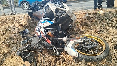 Motorcycle accident on Hyderabad highway involving a high-speed crash.
