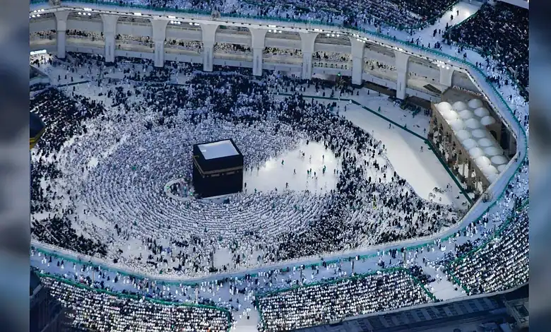 Aerial view of pilgrims performing Tawaf around the Kaaba at the Grand Mosque in Makkah during evening prayers.