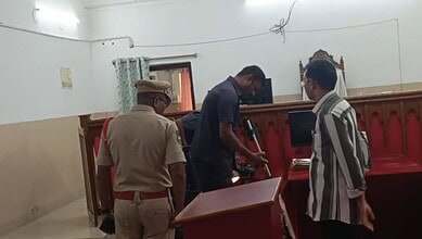 The image shows the bomb squad searching for explosive material inside the Warangal District Court after the court authorities received a bomb threat on Thursday, February 26, 2026.